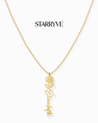 Gold flower name necklace with a birth flower charm and cursive name pendant on a fine chain