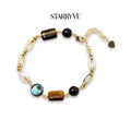 Gold plated earth elements bracelet with tiger's eye, obsidian, pearl, and abalone