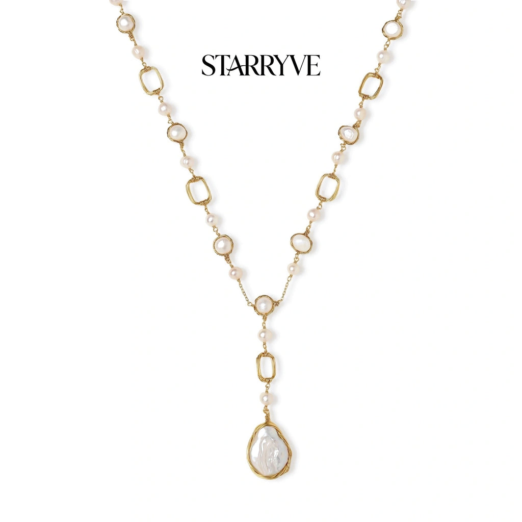 Lumina pearl station necklace with freshwater pearl stations and baroque pearl pendant drop