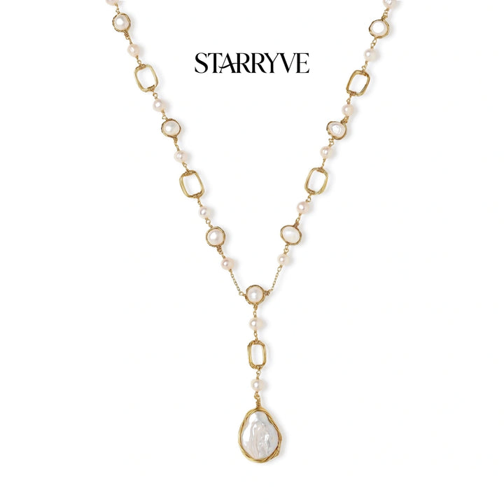 Lumina pearl station necklace with freshwater pearl stations and baroque pearl pendant drop