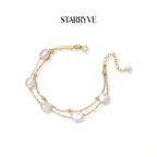 Baroque pearl layered bracelet with double gold chain and five baroque pearls in 18K gold vermeil