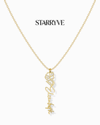 Silver flower name necklace with a birth flower charm and cursive name pendant on a fine chain