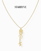 Gold flower name necklace with a birth flower charm and cursive name pendant on a fine chain