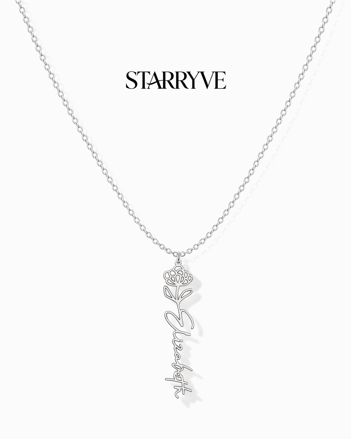 Silver flower name necklace with a birth flower charm and cursive name pendant on a fine chain