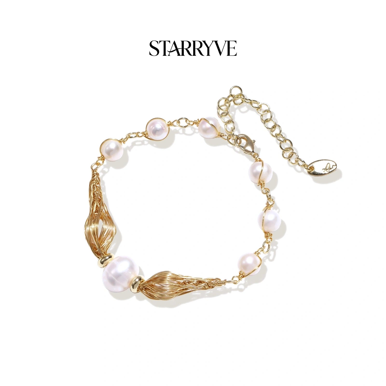 Golden spiral pearl bracelet with twisted gold wire forms and freshwater pearls