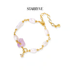 Amethyst dreams bracelet with rough-cut amethyst and baroque pearls on a gold chain