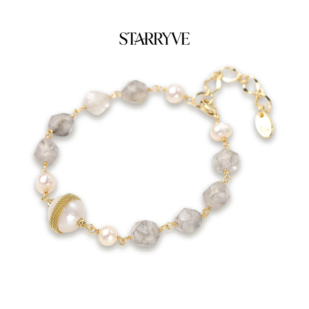 Baroque pearl crystal bracelet with grey gemstone beads and a gold coil-wrapped pearl