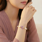 Woman wearing the amethyst dreams bracelet