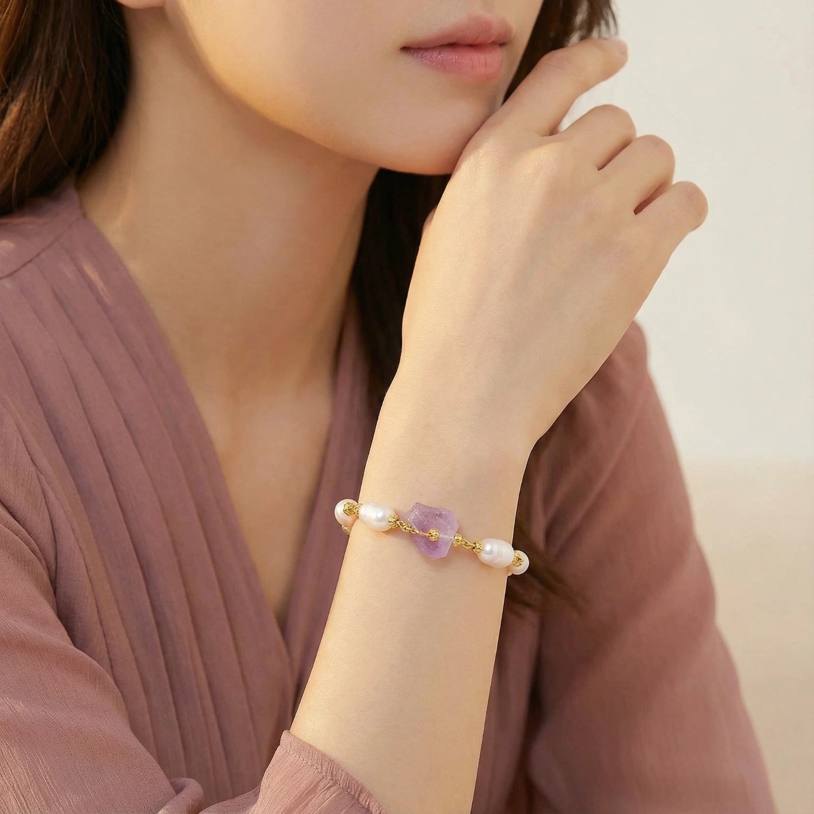Woman wearing the amethyst dreams bracelet