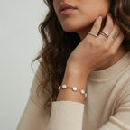 Close-up of the baroque pearl layered bracelet on the wrist