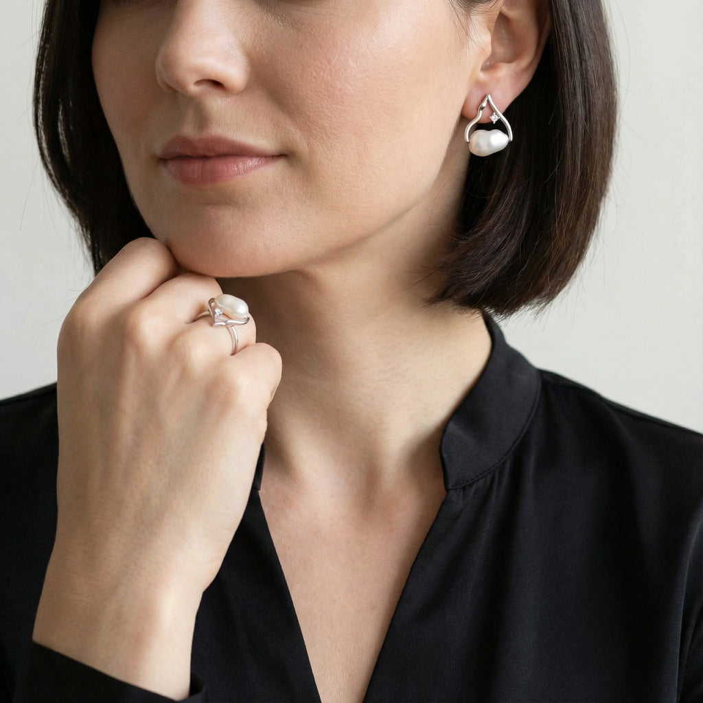 Model wearing Pearl Teardrop Earrings