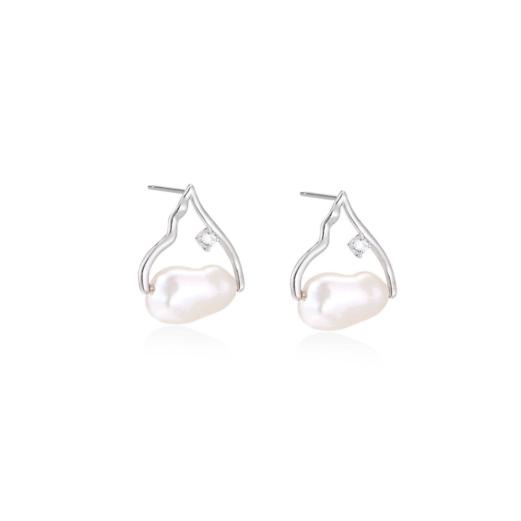 Model wearing Pearl Teardrop Earrings