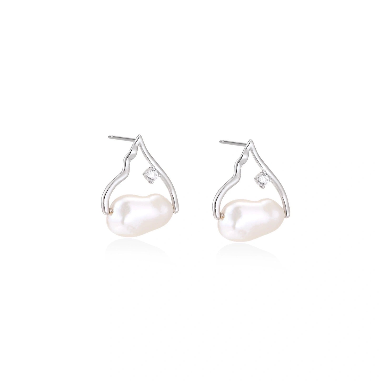 Model wearing Pearl Teardrop Earrings
