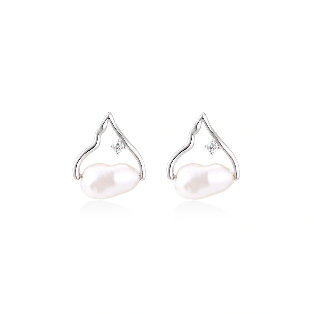Model wearing Pearl Teardrop Earrings