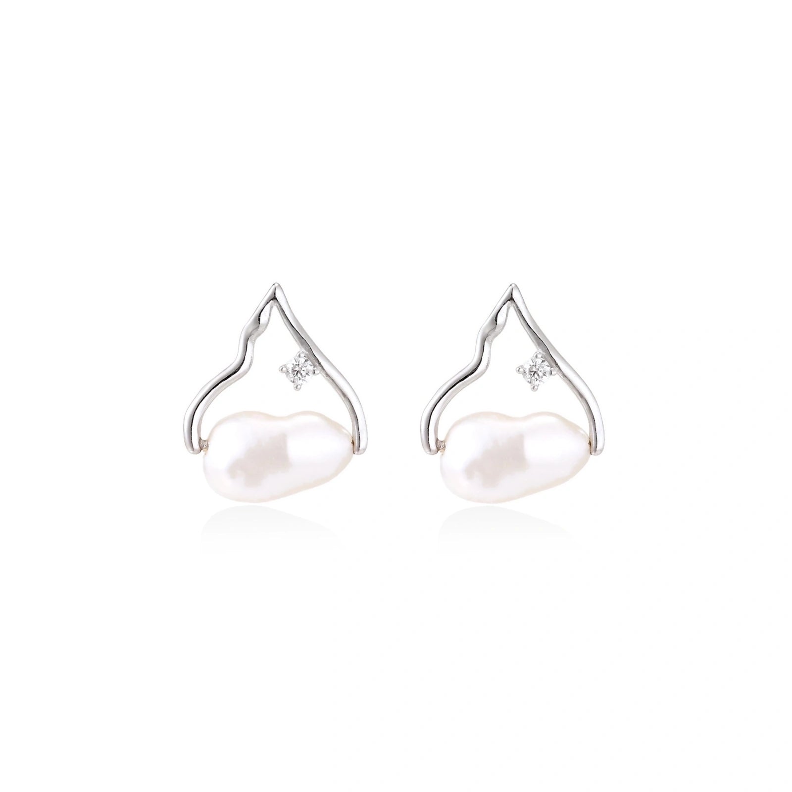 Model wearing Pearl Teardrop Earrings
