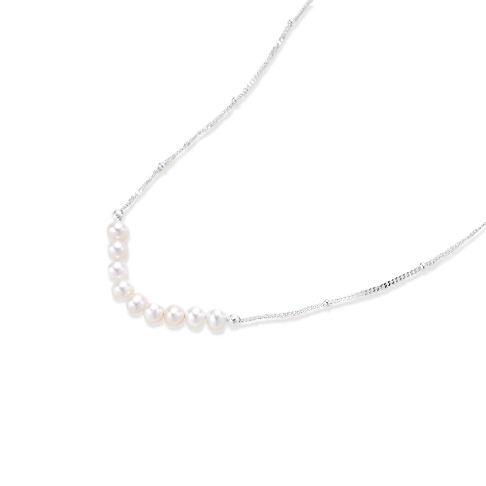 Model wearing Luna Pearl Arc Necklace