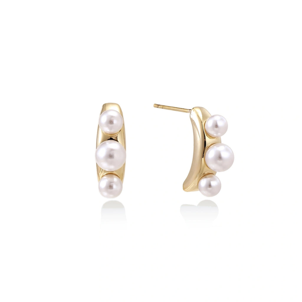 Model wearing Pearl Trio Curve Studs