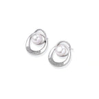 Model wearing Pearl Orbit Studs