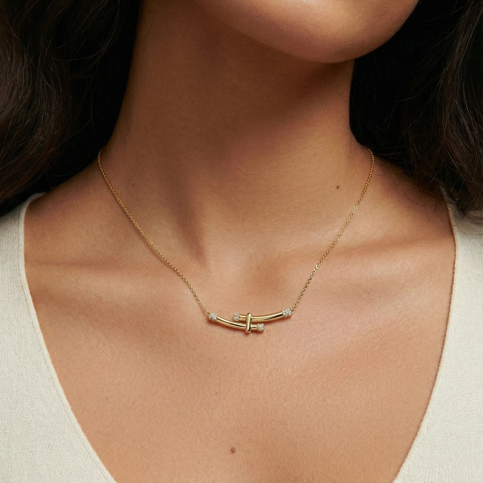 Model wearing Bamboo Crystal Arc Necklace