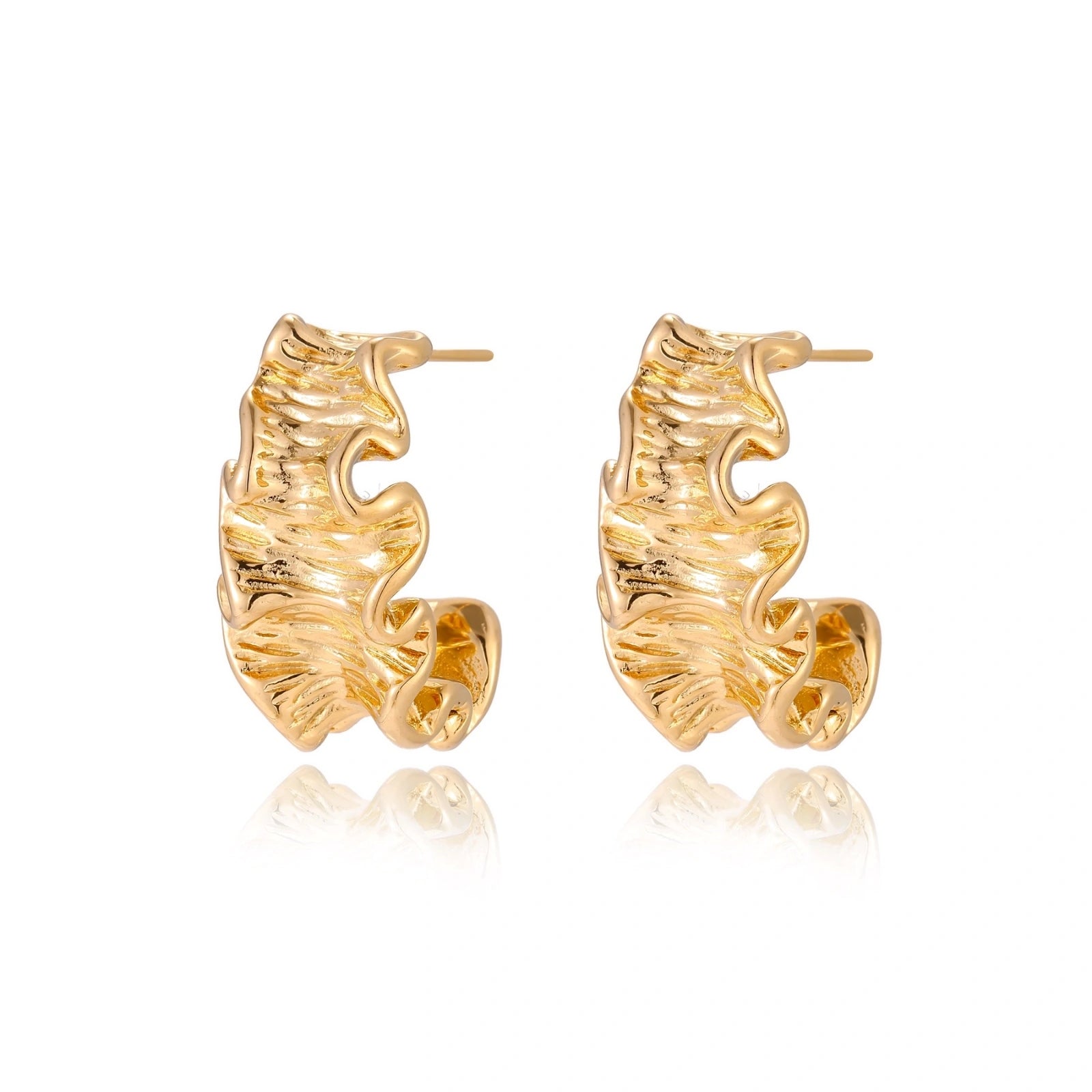 Model wearing Wave Flow Hoop Earrings - Gold Ruffled Texture