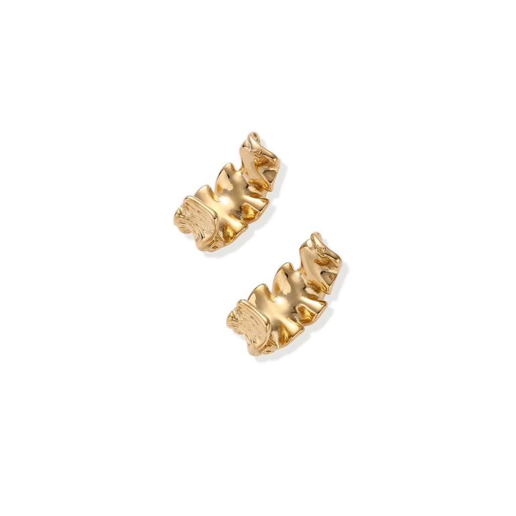 Model wearing Wave Flow Hoop Earrings - Gold Ruffled Texture