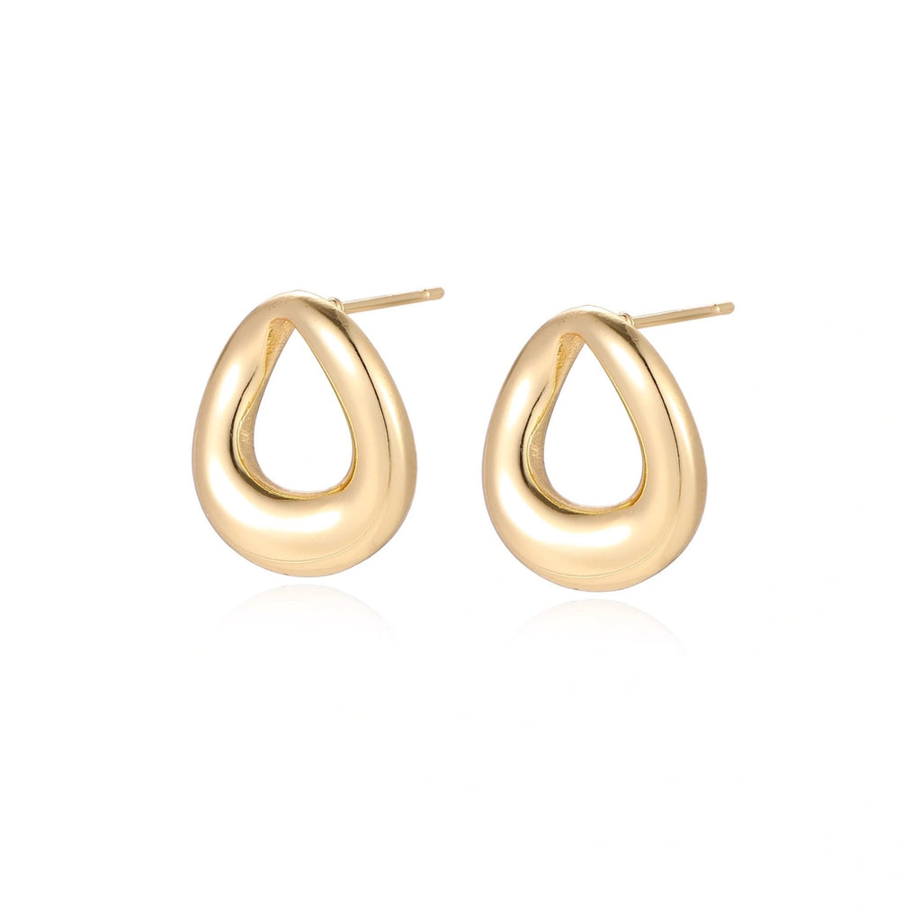 Model wearing Golden Loop Studs