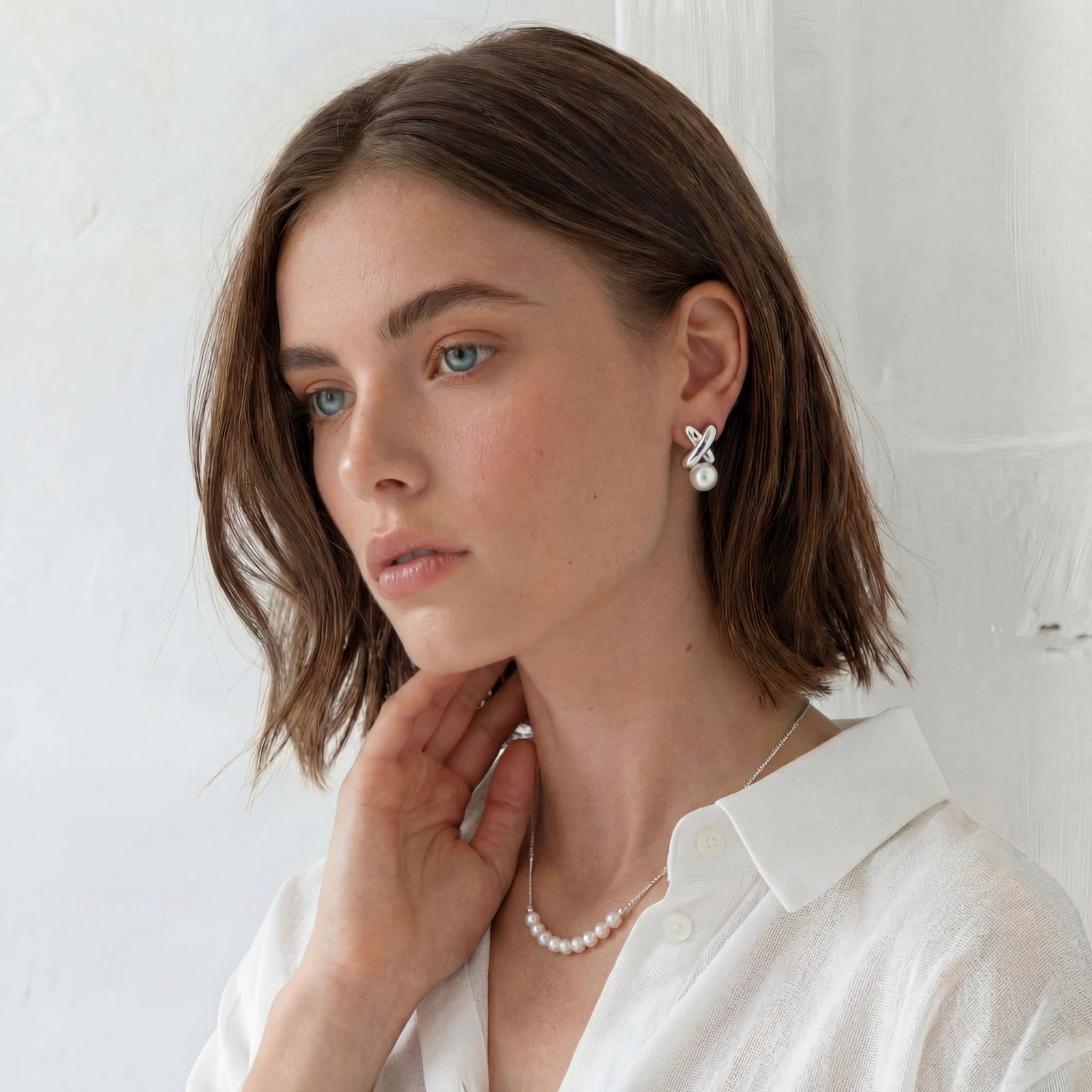 Model wearing Luna Pearl Arc Necklace