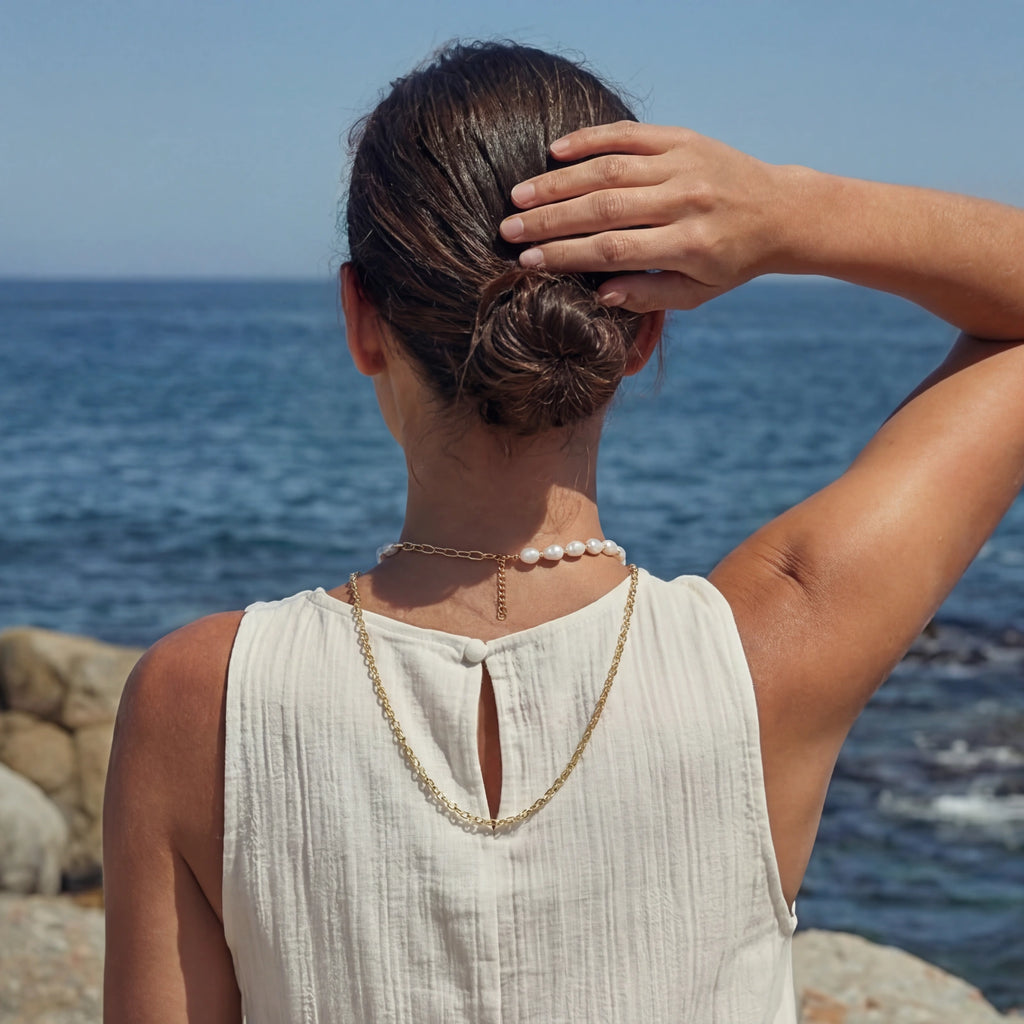 Back view of the pearl layers necklace worn with an updo hairstyle