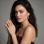 Woman wearing the emerald garden necklace and pearl drop earrings set