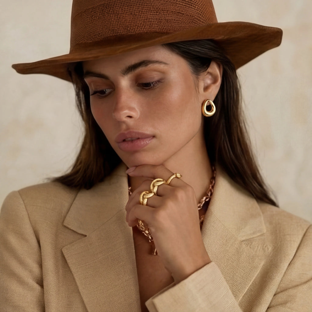 Model wearing Golden Loop Studs