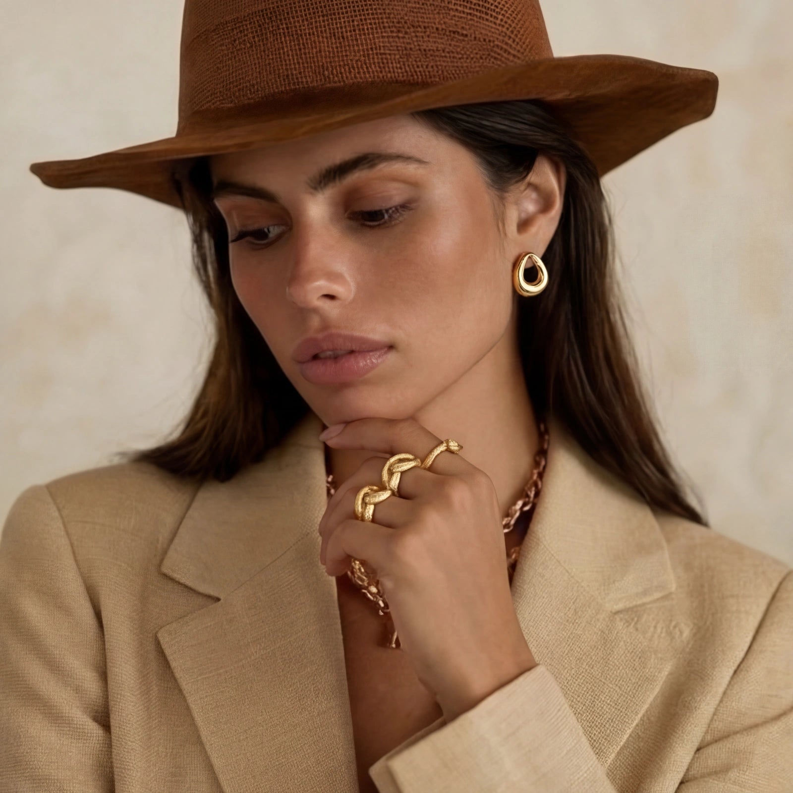 Model wearing Golden Loop Studs