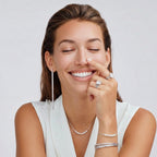 Model wearing Luna Pearl Arc Necklace