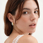 Model wearing Pearl Trio Curve Studs