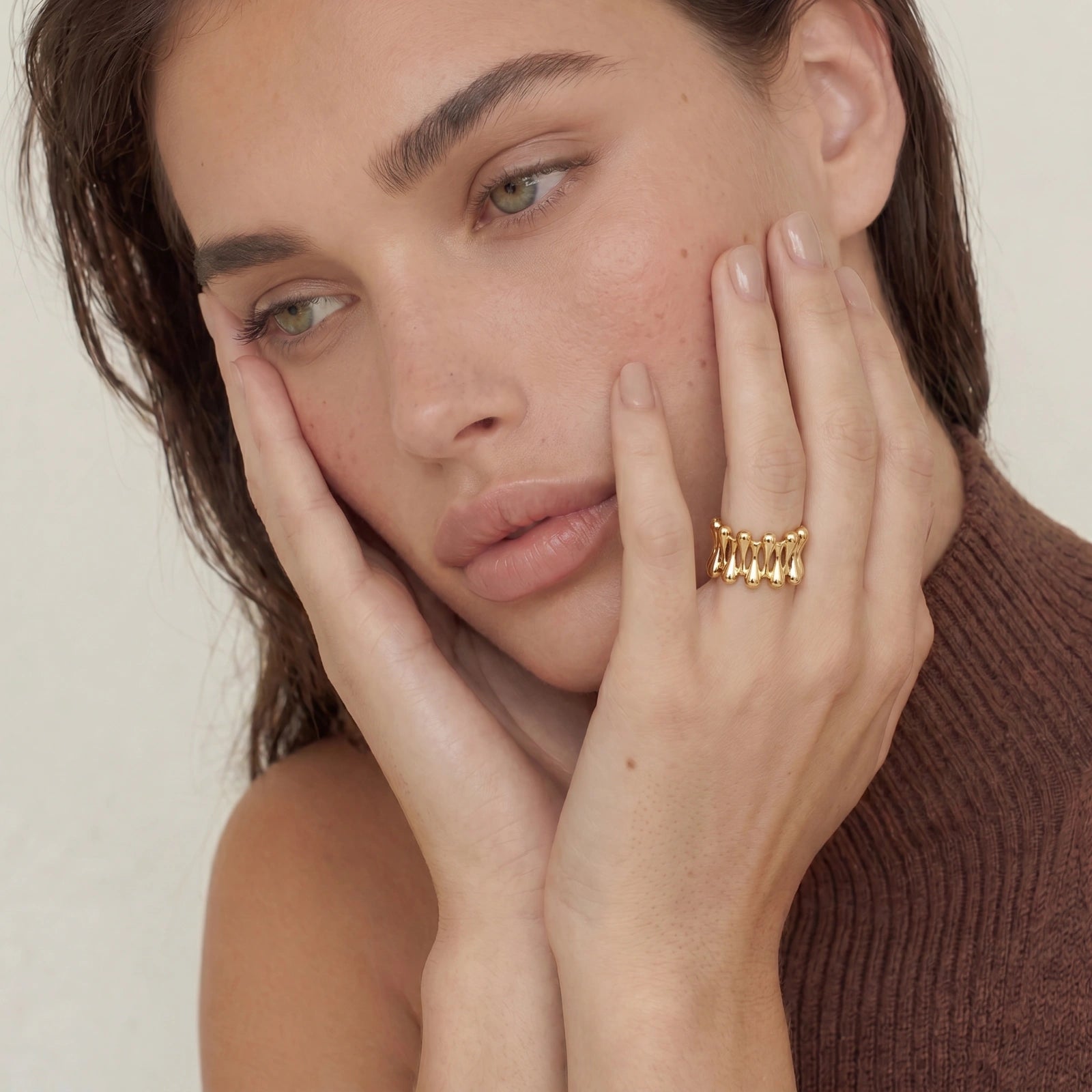 Golden Rope Sculpture Ring worn on the hand