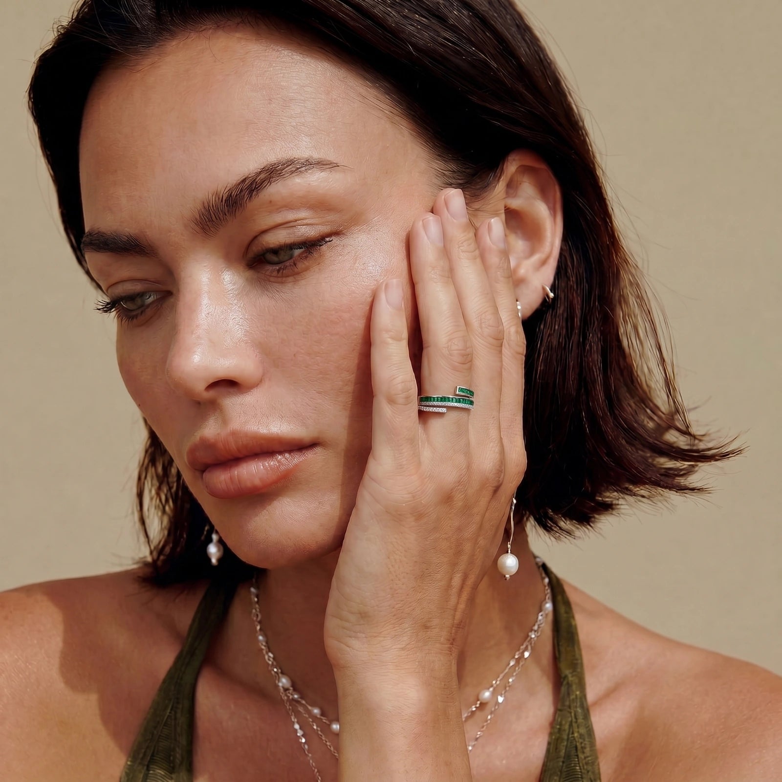 Emerald Layers Ring worn on the hand