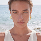 Model wearing Coral Reef Asymmetrical Studs