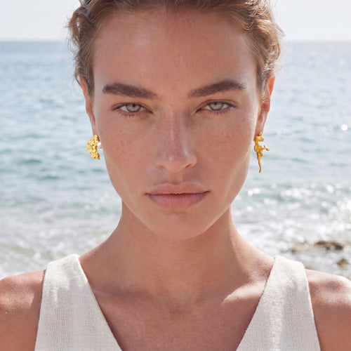 Model wearing Coral Reef Asymmetrical Studs