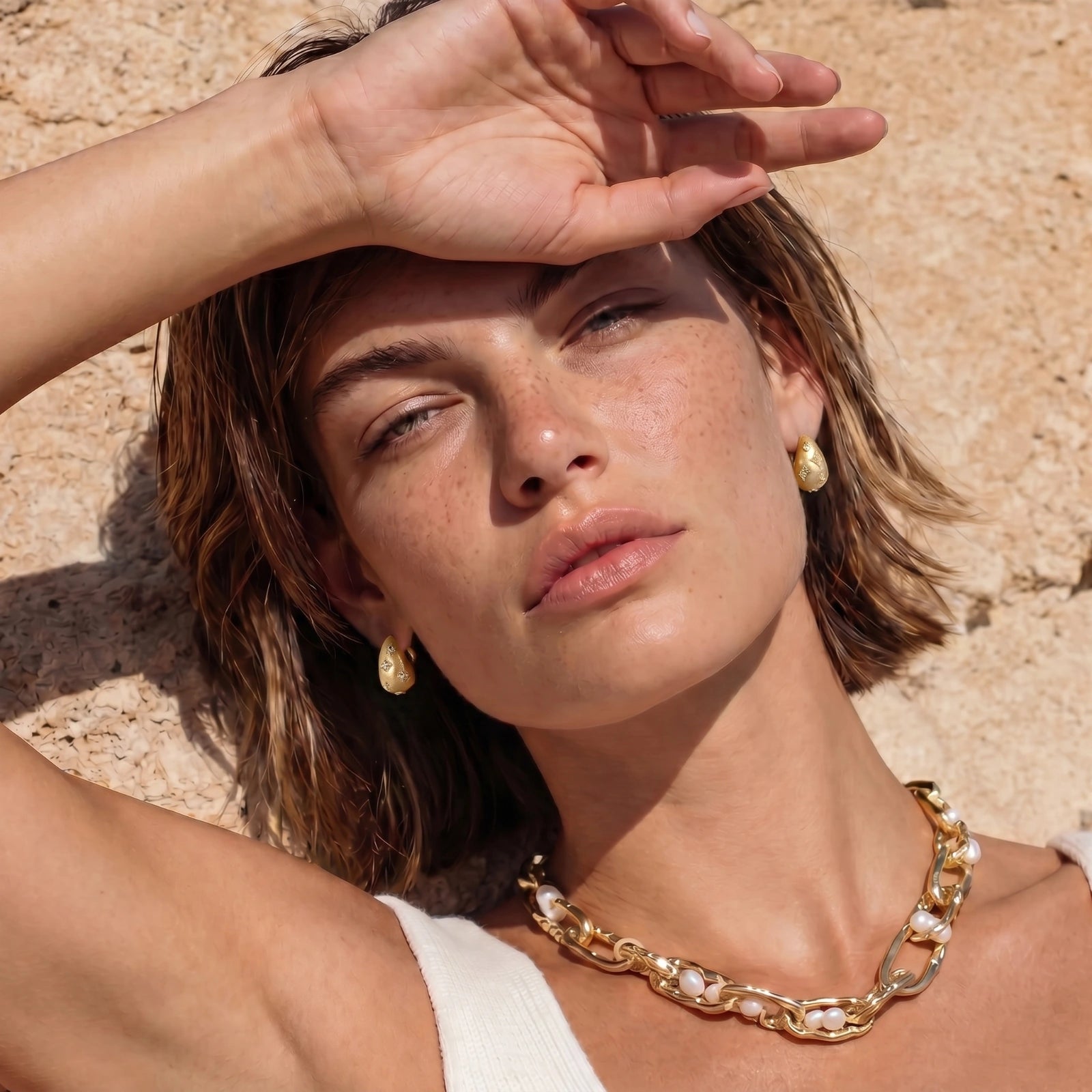 Model wearing Starlight Clover Hoops