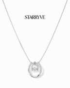 White gold lucky in love necklace with a floating cubic zirconia in an oval frame