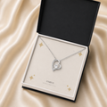 White gold forever love necklace in a black standard gift box