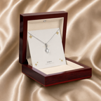 White gold alluring beauty necklace displayed in a mahogany LED luxury gift box