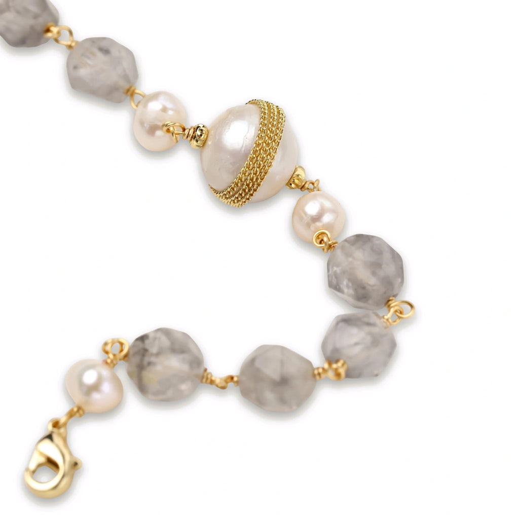 Close-up of the grey gemstone and baroque pearl bracelet