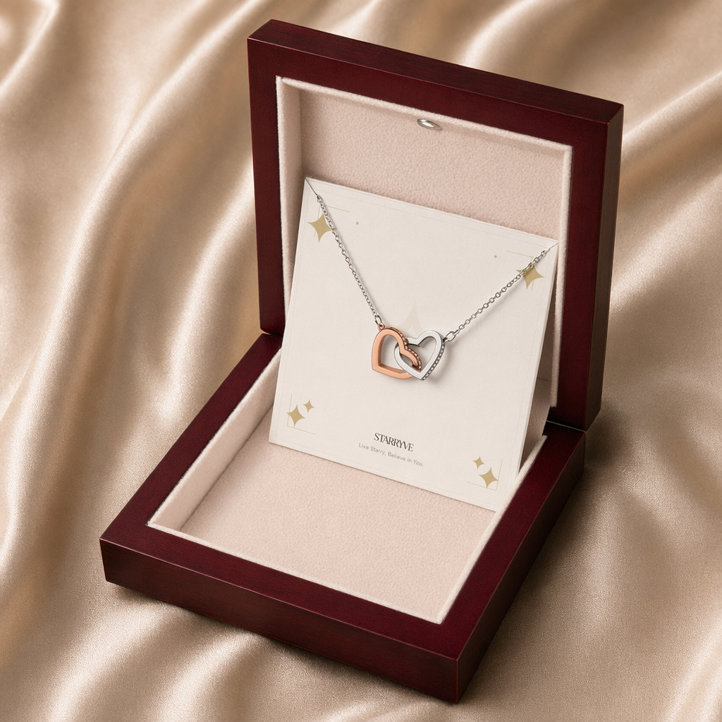 Rose and white gold interlocking hearts necklace in a mahogany LED luxury gift box