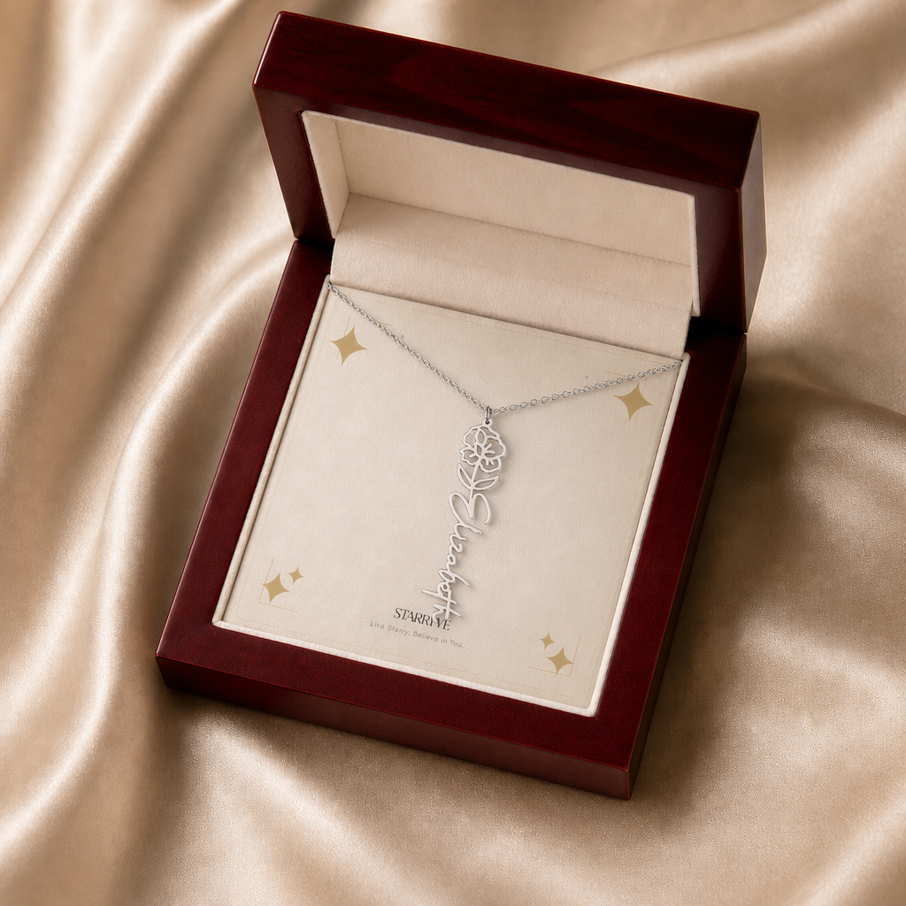 Silver flower name necklace with the August poppy birth flower, shown in a mahogany LED luxury gift box