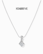 White gold alluring beauty necklace with a twisted ribbon cubic zirconia pendant