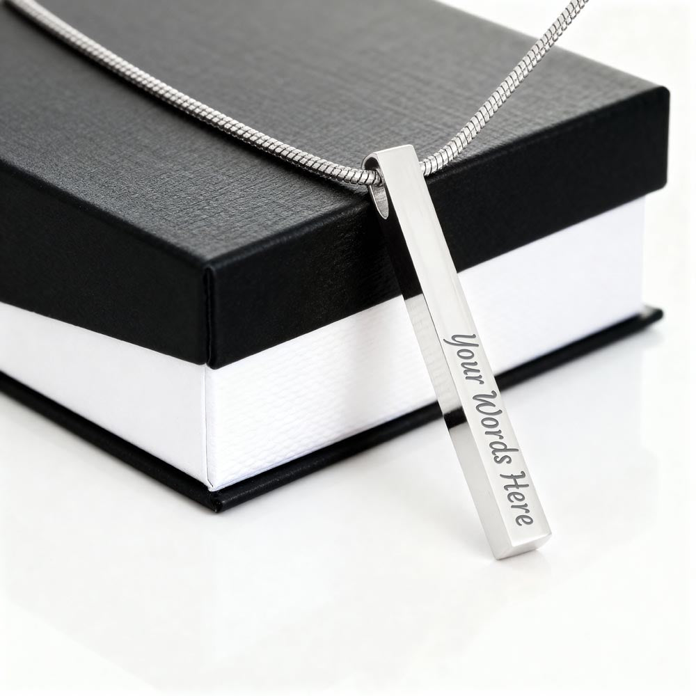 Personalized stainless steel bar necklace engraved "Your Words Here" on a gift box