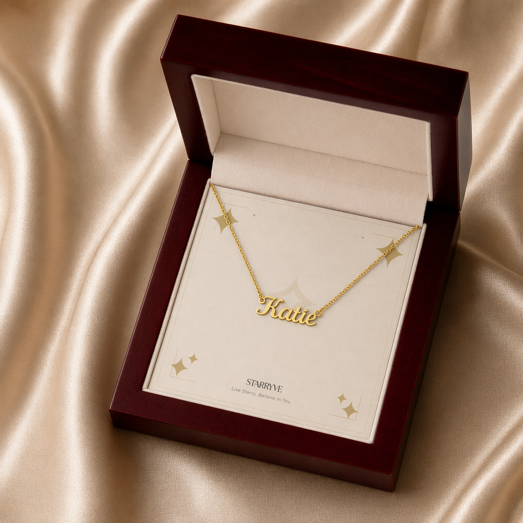 Gold custom name necklace displayed in a mahogany LED luxury gift box