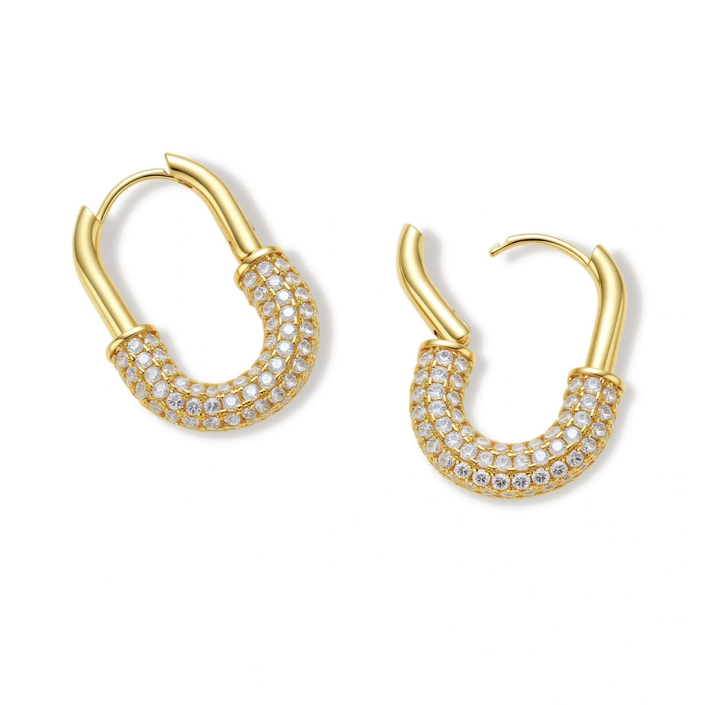 Model wearing Golden Glow Huggie Hoops