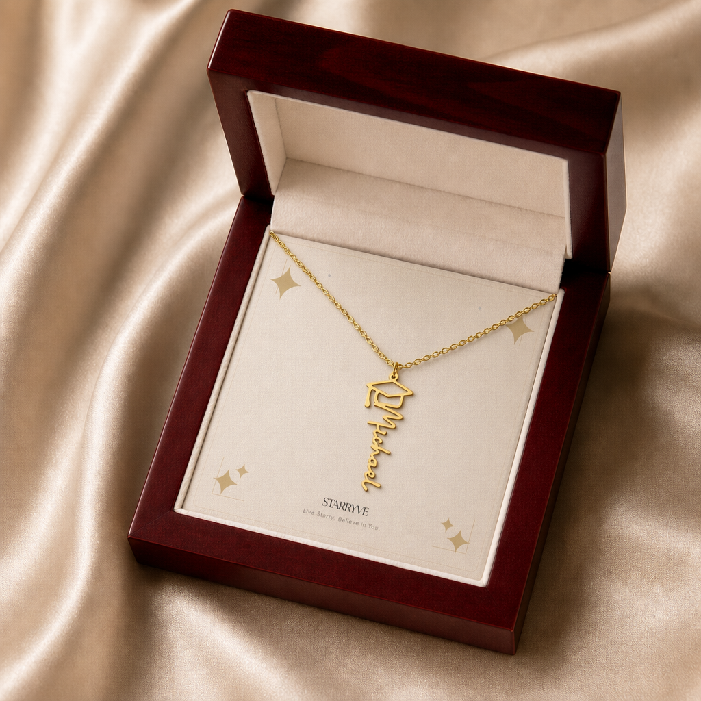 Gold graduation cap name necklace displayed in a mahogany LED luxury gift box