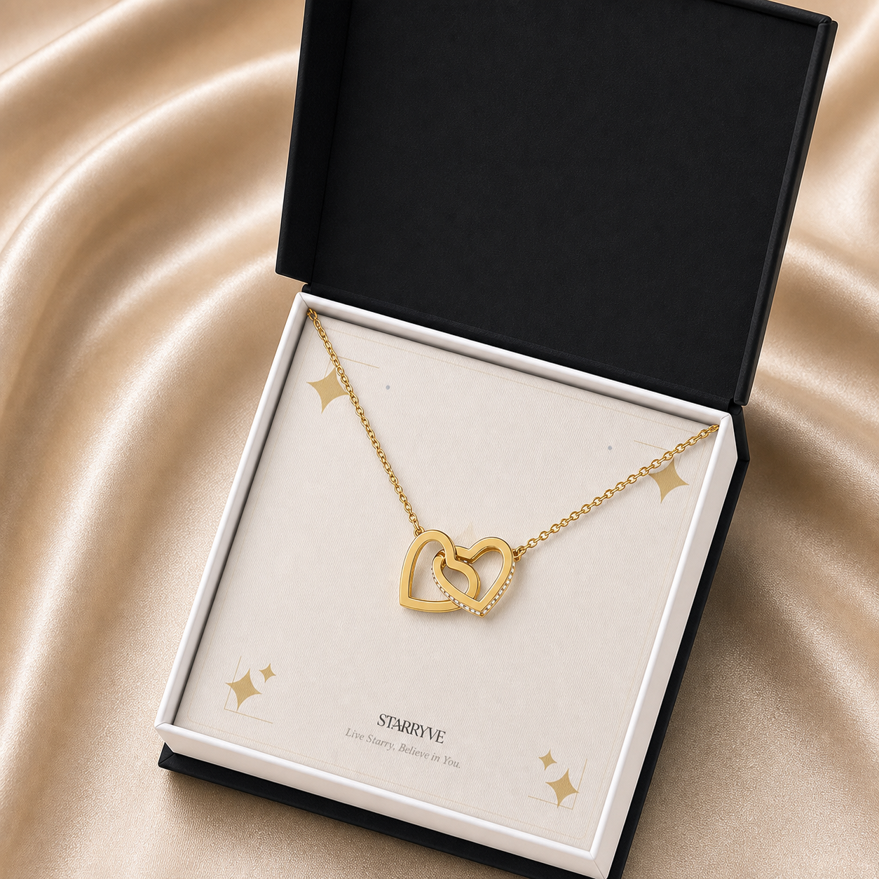 Gold interlocking hearts necklace in a black standard gift box
